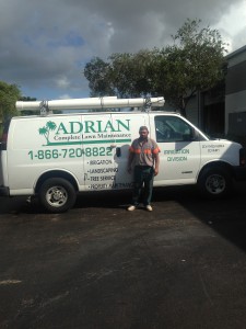 Joel In front of irrigation van